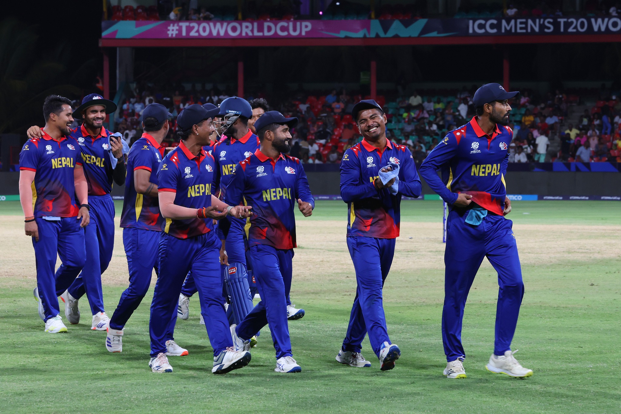 ST VINCENT, SAINT VINCENT AND THE GRENADINES - JUNE 14: Nepal players walk off the field after the first innings during the ICC Men's T20 Cricket World Cup West Indies & USA 2024 match between South Africa and Nepal at Arnos Vale Ground on June 14, 2024 in St Vincent, Saint Vincent and The Grenadines. (Photo by Matthew Lewis-ICC/ICC via Getty Images)